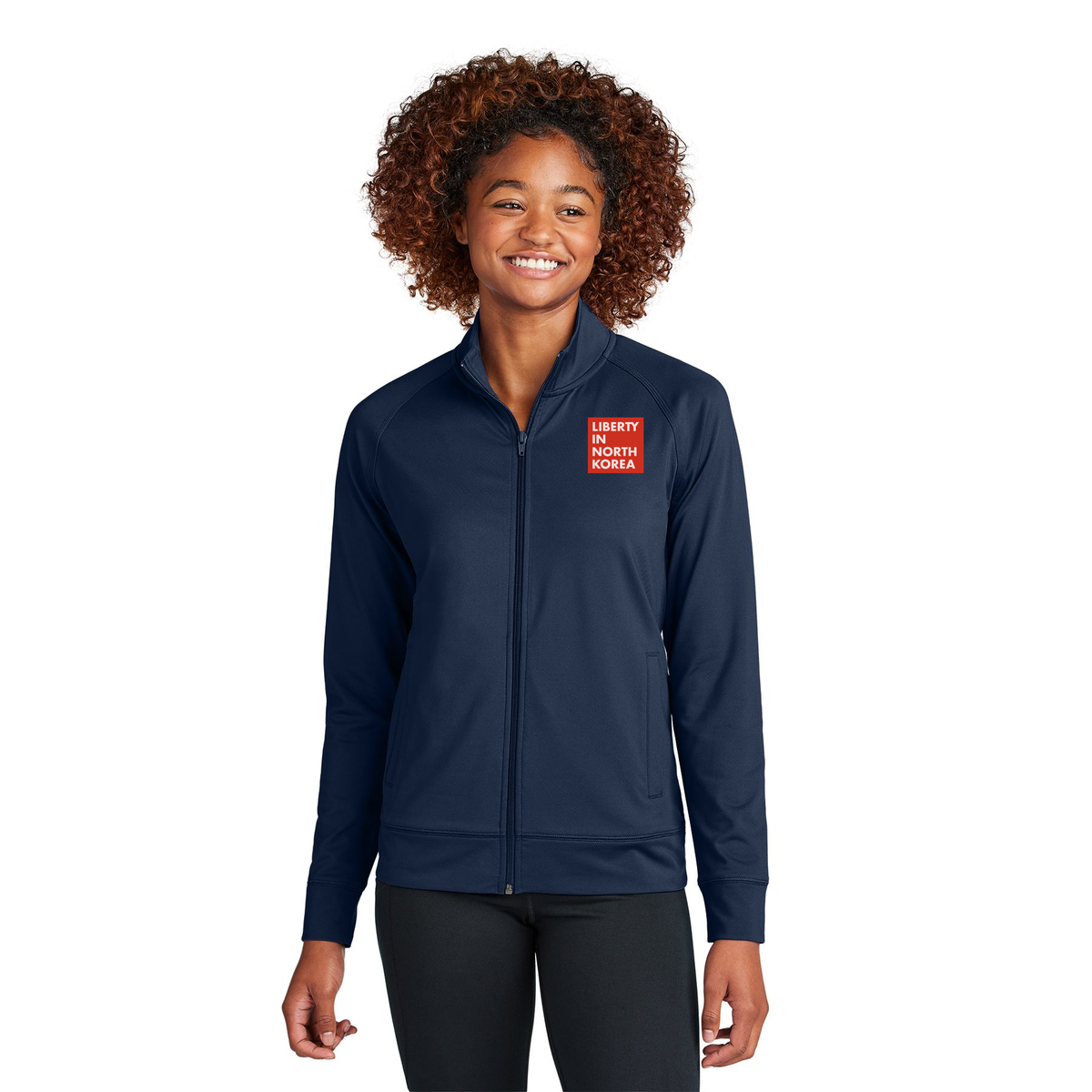libertyinnorthkorea-sport-tek-womens-cadet-jacket-primary-mockup